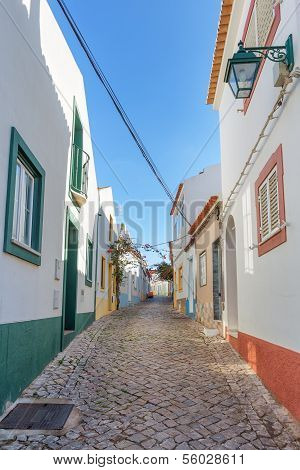 Ancient Street Of The Village Of Ferragudo. Portugal, Portimao.