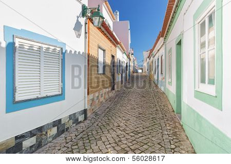 Traditional Old Portuguese Street With Stone Lane. Ferragudo.