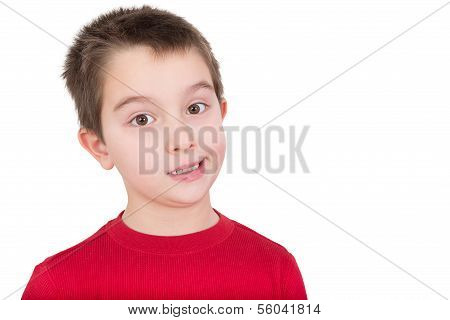 Skeptical Young Boy Reacting In Disbelief