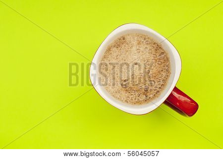 Tasse Espresso auf gelbem Grund, grÃ¼n