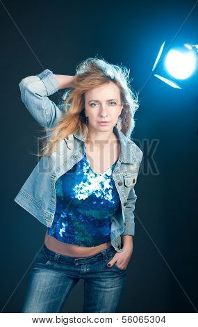 Fashion studio portrait of gorgeous young woman.