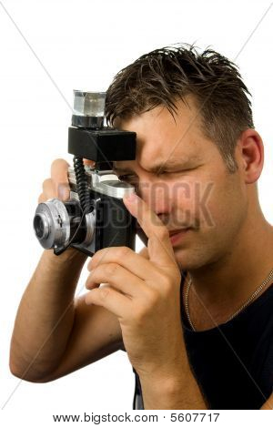 Manden er at tage foto med gamle gammeldags kamera