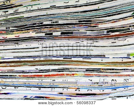 Cut printed paper closeup background.