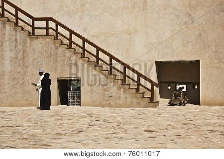 A couple in the Nizwa Fort Castle