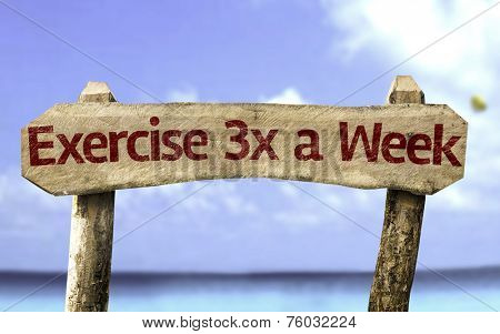 Exercise 3x a Week sign with a beach on background