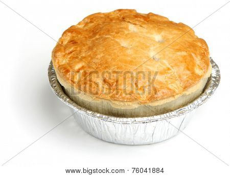 Steak meat pie in foil tray.