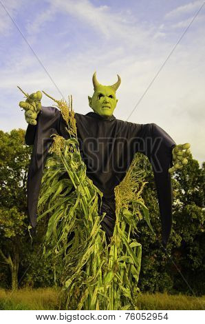 Scarry demon in a corn field
