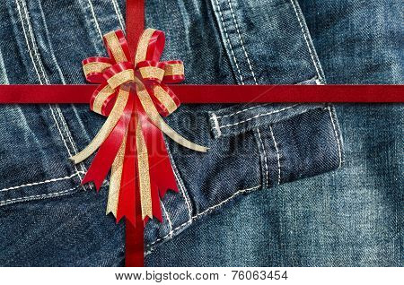 Red Ribbon On  Detailed Scan Of Jeans For Background