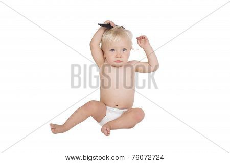 Young boy with black comb