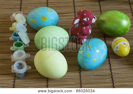 Painted Easter eggs, the painting process, box of paints