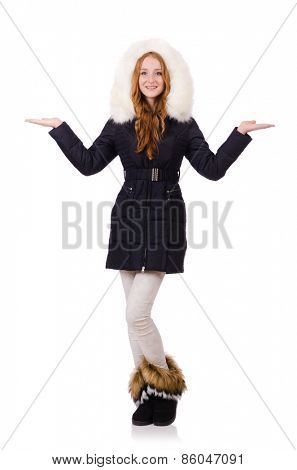 Pretty girl in warm clothes isolated on white