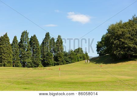 Bowness on Windermere Lake District England UK golfers enjoying tourist attractions such as mini gol