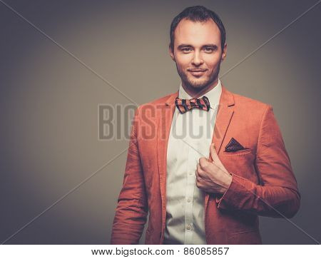 Sharp dressed fashionist wearing jacket and bow tie