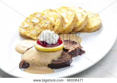 sirloin on cream with dumplings