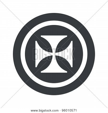 Round black maltese cross sign