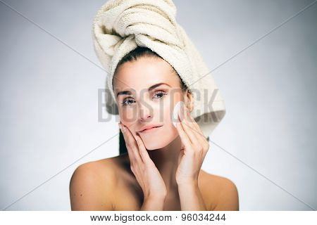 Fresh Girl Cleaning Face With Cotton Swab