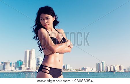 Sexy tourist girl in Dubai city beach