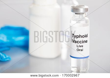 Close-up Of Typhoid Vaccine In Vial Bottle