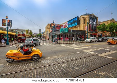 San Francisco, California, United States - August 14, 2016: GoCar Sightseeing Tour at Fisherman's Wharf waterfront. Freedom travel concept. San Francisco street view. America travel tourism.
