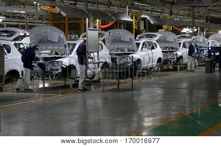 Tianjin, China. December 17Th 2016: Workers Assemble A Car On Assembly Line In Car Factory