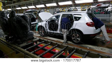 Tianjin, China. December 17Th 2016: Workers Assemble A Car On Assembly Line In Car Factory