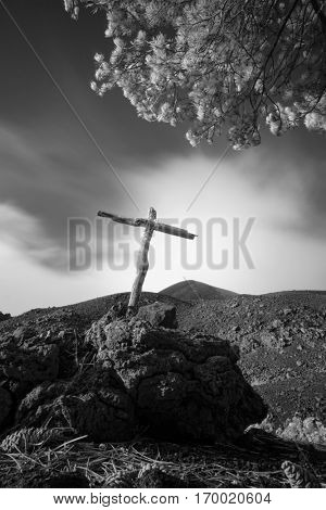 wooden cross of De Fiore craters born on 1974 in Etna Park, Sicily 