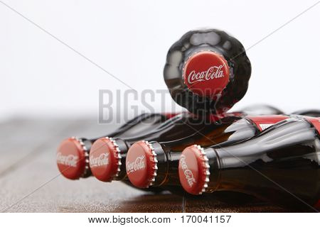 Kuala Lumpur, Malaysia 12th December 2016,coca cola soft drink on wooden table top