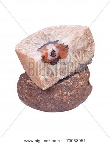 Light brown natural crystal agate geode bookend polished on isolated on white background