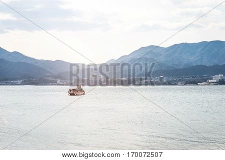 Ferry-boat In Island Of Miyajima - Hiroshima, Japan. View From The Miyajimaguchi City Pier