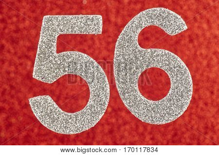 Number fifty-six silver color over a red background. Anniversary. Horizontal