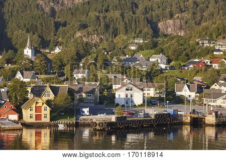 Traditional norwegian fjord village with harbor. Jondal. Hardanger route. Horizontal