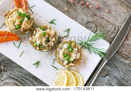 Cooked Artichokes  With Rice, Green Peas, Carrot And Olive Oil. Turkish Dish - Zeytinyağlı Enginar.