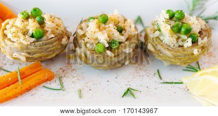 Cooked Artichokes  With Rice, Green Peas, Carrot And Olive Oil. Turkish Dish - Zeytinyağlı Enginar.