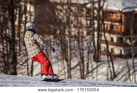 JANUARY, 23 ,2015,Rosa Khutor : Snowboarder rides on the slopes of Rosa Khutor, Krasnaya Polyana ,Sochi, Russia.