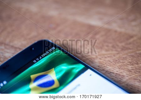 Smartphone With 25 Percent Charge And Brazil Flag