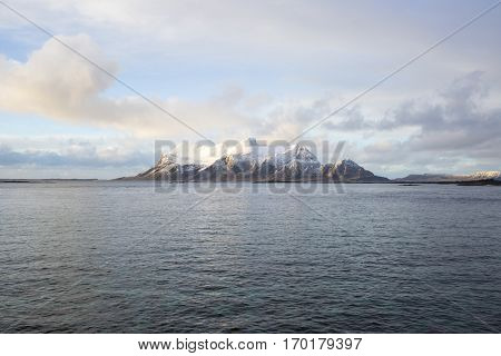 View of a Norwegian fjord with snowy mountains Nordland Norway
