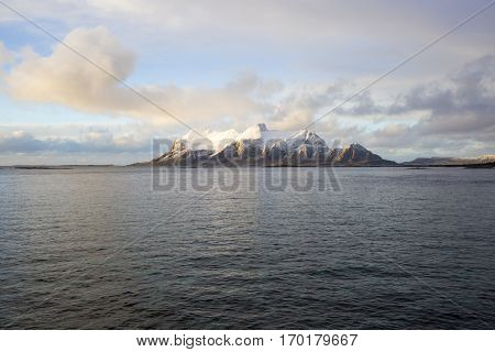 View of a Norwegian fjord with snowy mountains Nordland Norway