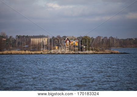 Little Finish wooden house on an island offshore Helsinki Finland