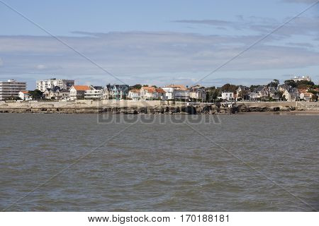View of the coastline with seaside resort of Royan with grey tourmented sky France