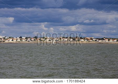 View of the coastline with seaside resort of Royan with grey tourmented sky France