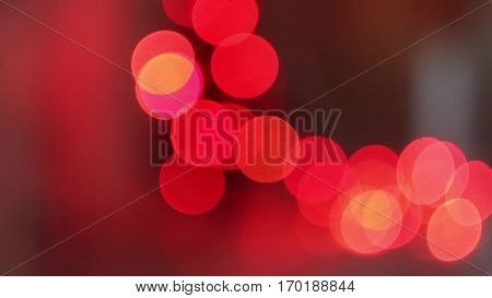 Christmas and New Year Decoration. Abstract Blurred Bokeh Holiday Background. Blinking Garland. Christmas Tree Lights Twinkling.