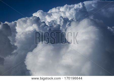 Close up on dark fluffy storm clouds