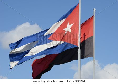 National flag of Cuba and flag of the movement of 26 July