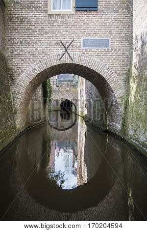 Canal called Binnendieze running under the city center of 's-Hertogenbosch or Den Bosch The Netherlands