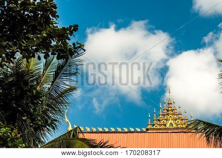 Beautiful roof and a lot of great sky next to the Great Stupa in Vientiane, Laos