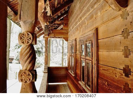 Carving Porch Of An Old Wooden Village Hut