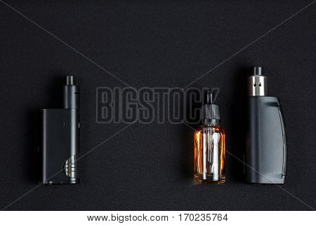 Electronic cigarette for vaping on a black background