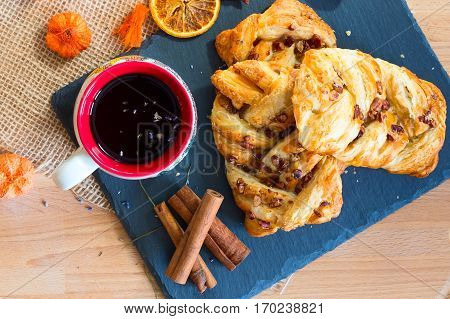 marple and pecan plait pastry sweet food breakfast with tea cup