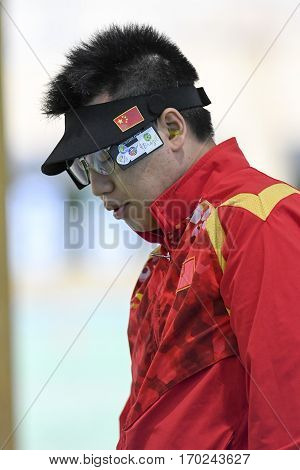 Rio Brazil - august 10 2016: PANG Wei (CHN) during shooting 50m Pistol Men Shooting at Olympic Games 2016 in Olympic Shooting Centre Deodoro