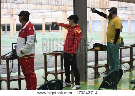 Rio Brazil - august 10 2016: WANG Zhiwei (CHN) during shooting 50m Pistol Men Shooting at Olympic Games 2016 in Olympic Shooting Centre Deodoro